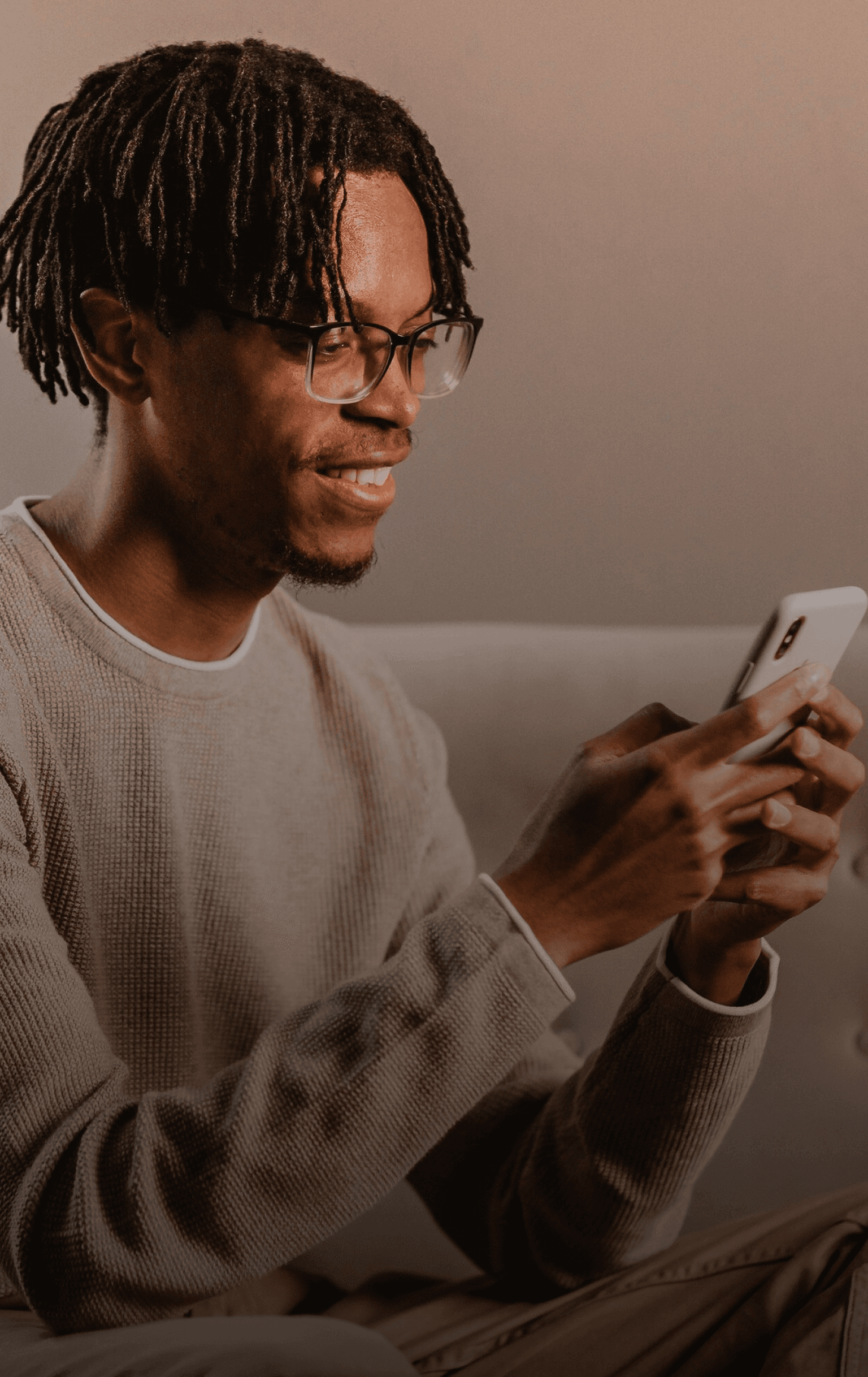 Creator answering storefront orders and messages from his phone